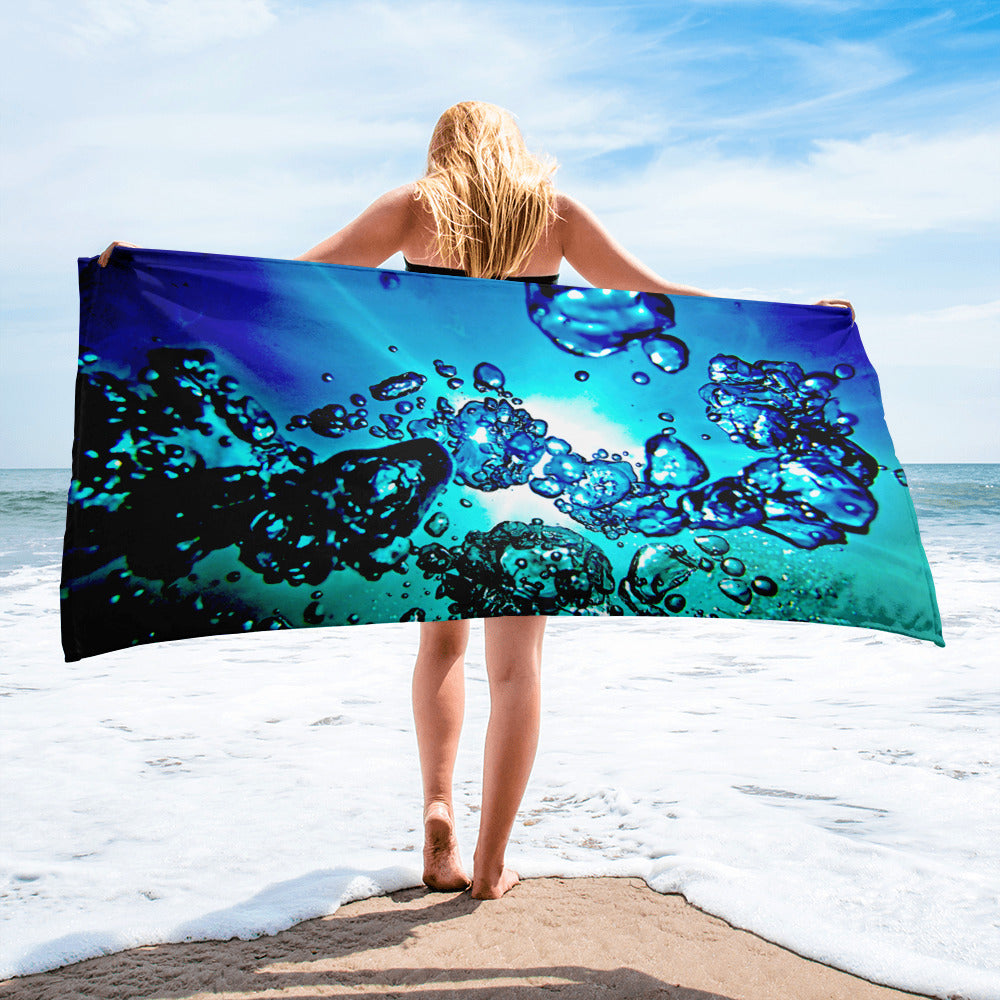 A bold overall print of sunlight water and bubbles on our popular bath or beach towel.